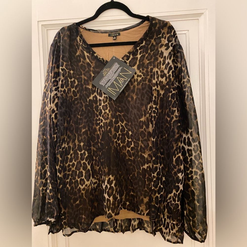 Iman brand long sleeve leopard print blouse . Tan lining underneath. Size 2x